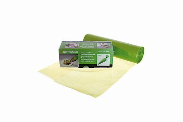 Grüne Einwegspritzbeutelrolle mit Verpackung